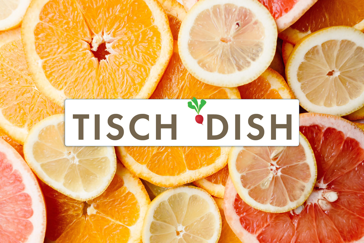 Tisch Dish logo on a background of oranges